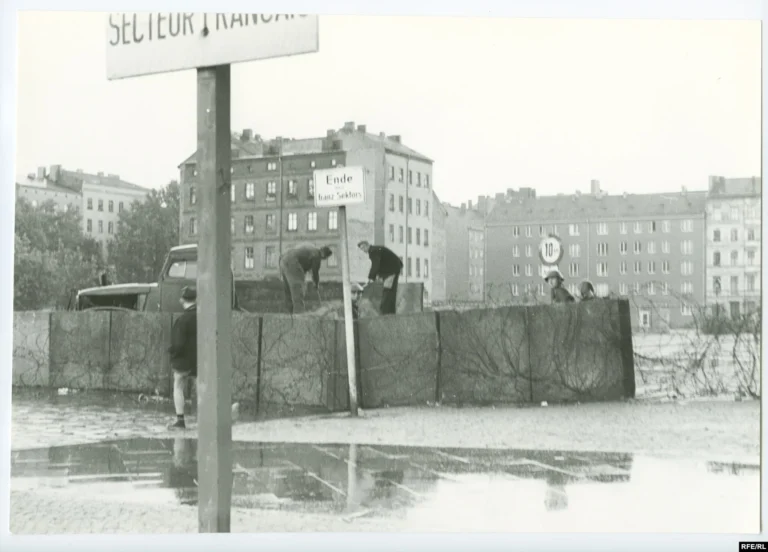 East German personnel constructing an early Berlin border barrier in 1961