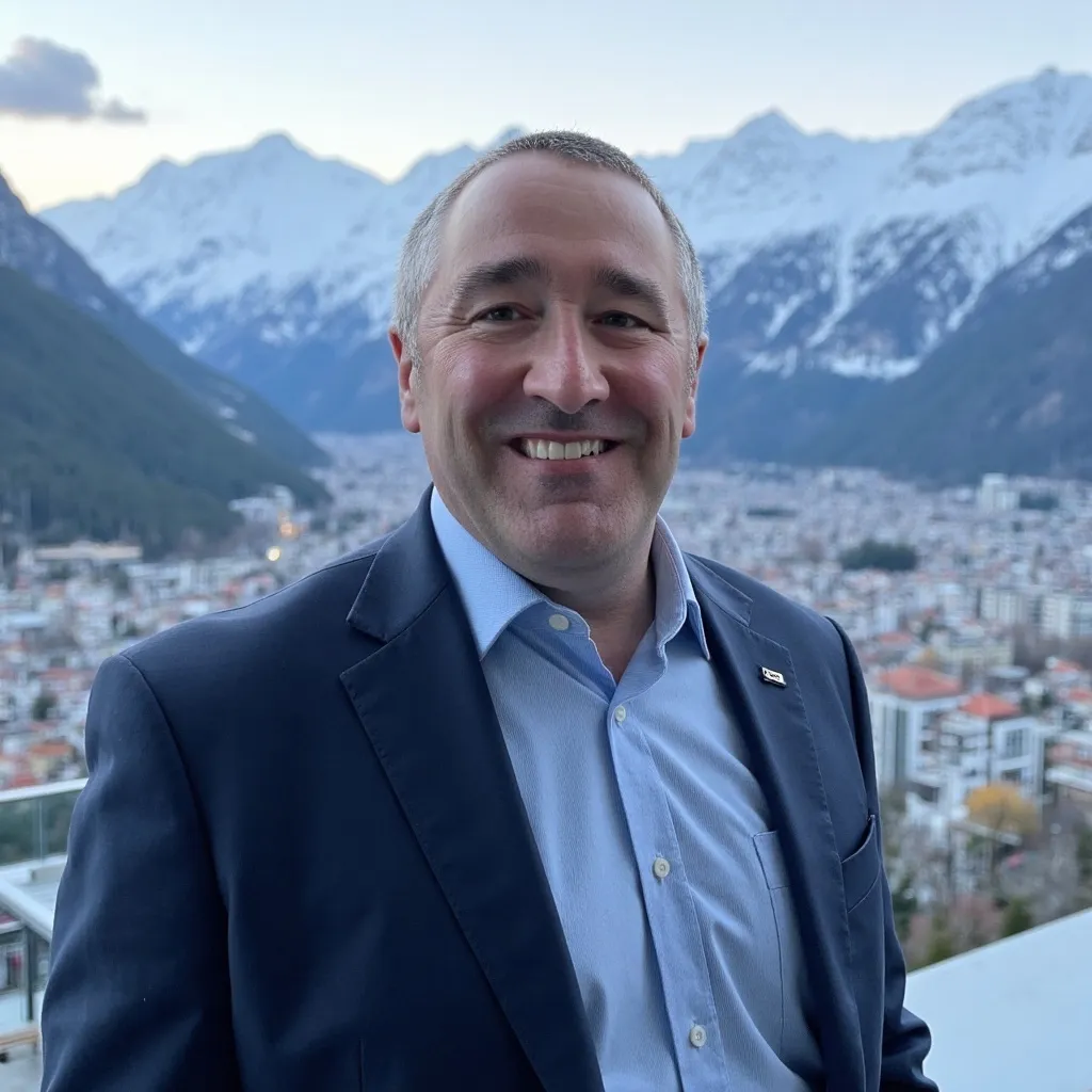 Tradecraft Travel founder Jack Buchanan overlooking a mountain destination