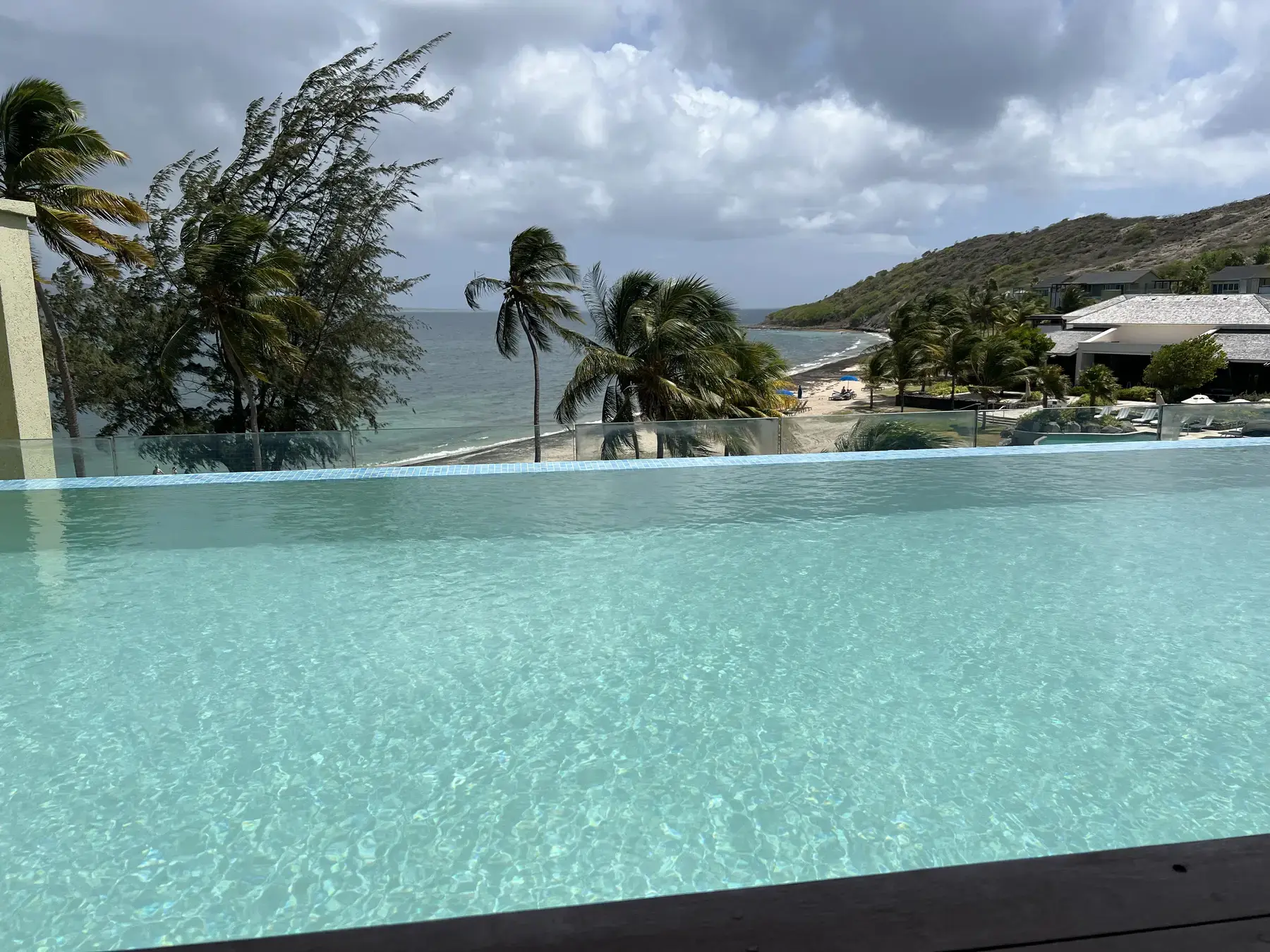 Private infinity pool overlooking the coast from a premium Park Hyatt St. Kitts accommodation