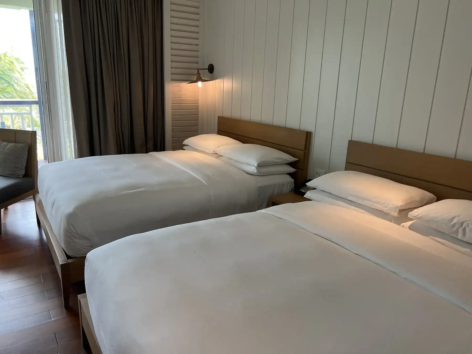 Two queen beds in a bright guestroom at Park Hyatt St. Kitts