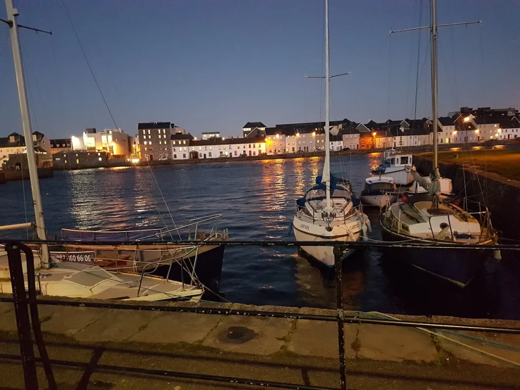 Galway waterfront along the River Corrib at dusk