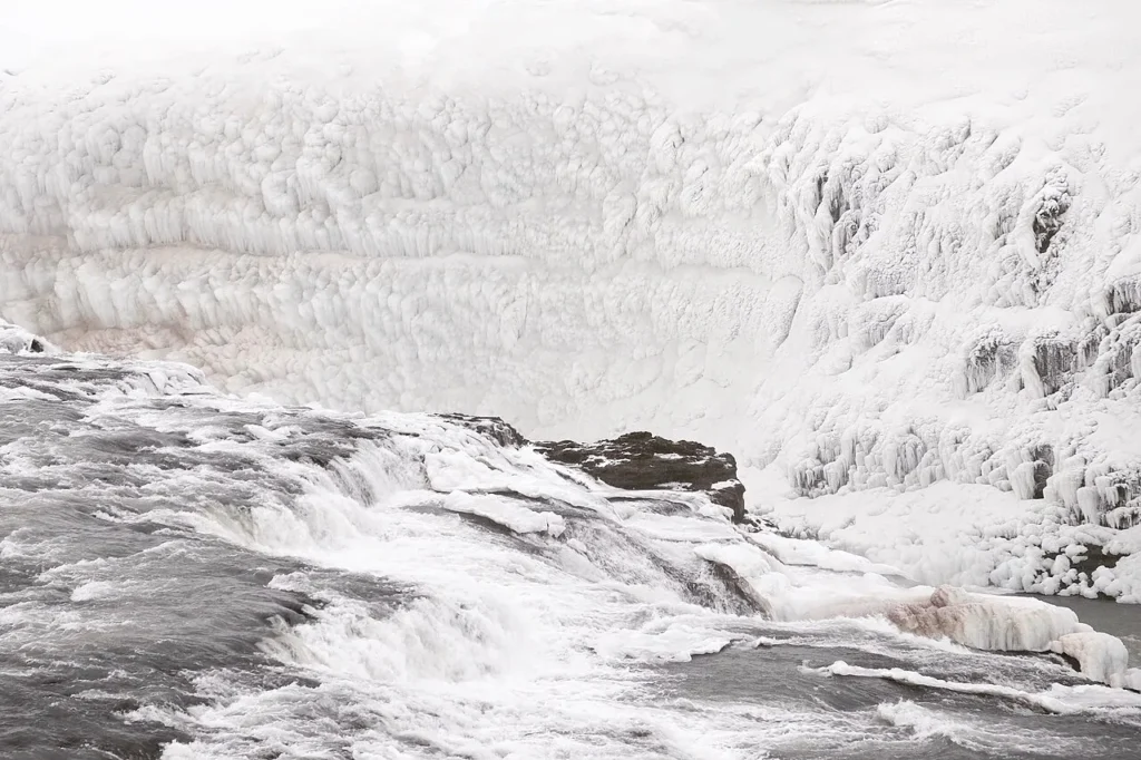 Gullfoss waterfall edged by snow and ice in winter, Iceland